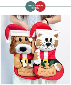 Detailed view of handmade Christmas stockings with 3D cat and dog plush animal faces