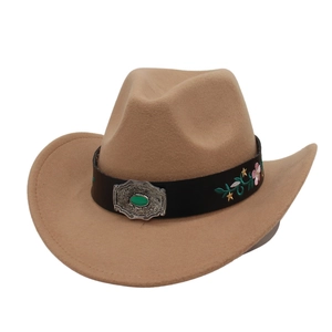 Detail of khaki felt cowboy hat with embroidered floral band and vintage silver buckle