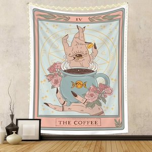 Cozy home decor showing a tarot style coffee tapestry with moon and star patterns