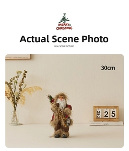Detail of 30cm Santa Claus figurine with faux fur coat holding a lantern and tree