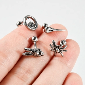 Gothic stainless steel stud earrings set featuring spider and skull designs in retro silver