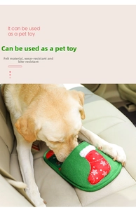 Close-up of durable Christmas pet slipper toy with festive red sock and snowflake detail