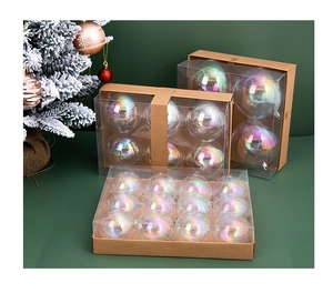 Detail view of iridescent clear Christmas ball ornaments in kraft window gift boxes