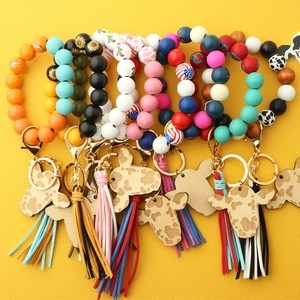 Western style cow head keychains with colorful silicone beads and leather tassels