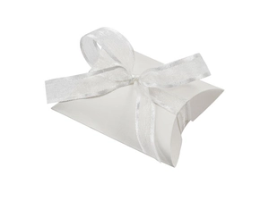 Close-up of a white pillow candy box with a neat semi-transparent white ribbon bow