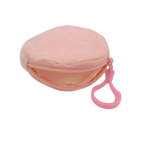 Detailed view of a small pink plush coin purse with a matching zipper and plastic hook