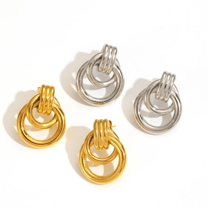 Two-tone geometric twisted circle stud earrings in gold and silver finish stainless steel