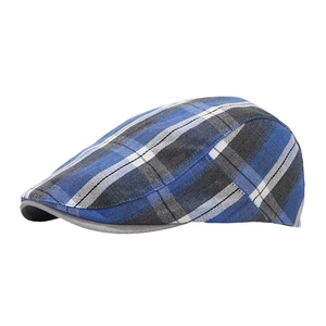 Classic British plaid flat cap in blue and grey pattern with a retro ivy style design