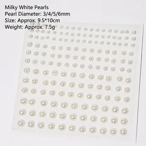 Detail of mixed size 3/4/5/6mm creamy white pearl stickers for DIY and nail art projects