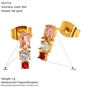 Detail view of 18k gold plated stainless steel stud earrings with three color zircons