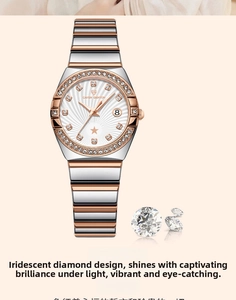 Detail of quartz watch with gold-silver strap, diamond bezel and star dial
