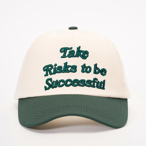 Two-tone baseball cap with Take Risks to be Successful embroidery in cream and green