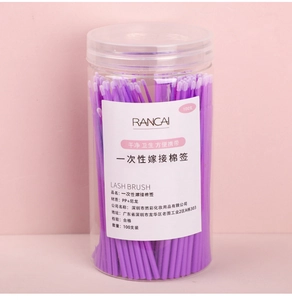 Close-up of 100 purple disposable eyelash extension swabs in a clear plastic jar