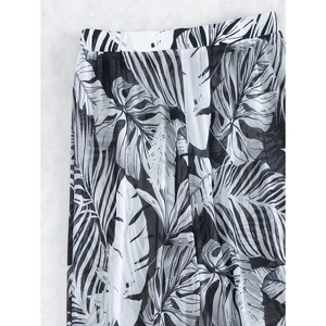 Three-piece bikini set with high-waist black and white palm leaf mesh trousers