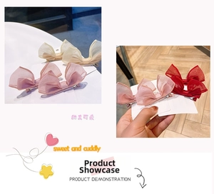 Detailed view of handmade mesh bow hair clips for girls in beige and pink tones