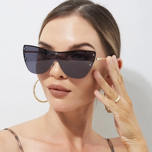 Occhiali da sole oversize senza montatura con lenti grigie e stanghette dorate