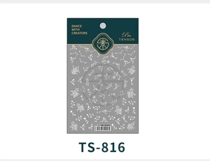 Macro shot of white lace flower and vine pattern nail art stickers TS-816 on grey paper