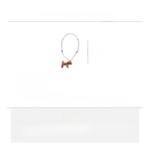 Detail of plush brown puppy pendant with wooden beads and long leather cord necklace