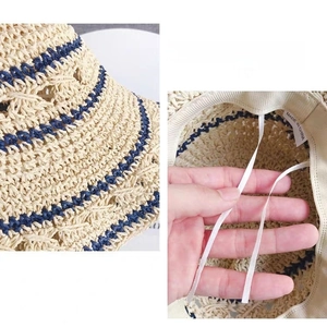 Foldable beige straw sun hat with blue stripes and hollow-out brim texture