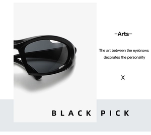 Detail view of smooth black Y2K cycling sunglasses featuring sleek curved frame and dark lenses