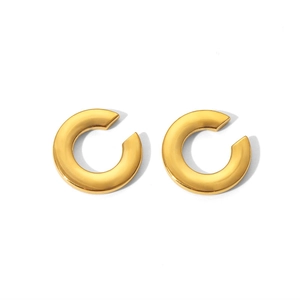 Macro detail of 18K gold plated stainless steel C-shaped earrings with a smooth finish