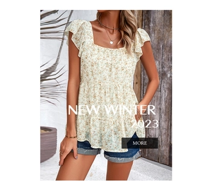 Detail of floral square neck top featuring flutter sleeves and a peplum waist design