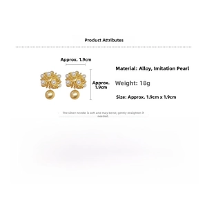 Detailed view of vintage gold flower earrings with pearls and silver needles specifications