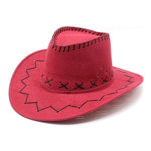Detailed view of a red cowboy hat with black stitching and metal eyelets on suede texture