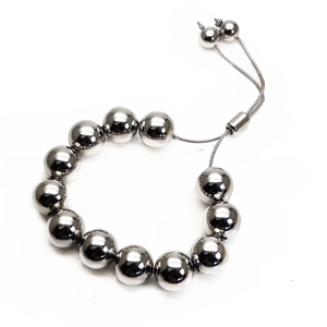 Detailed view of polished silver bead bracelet with adjustable slide drawstring clasp