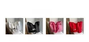 Four colors of large canvas tote bags in white black pink and red with small coin purses