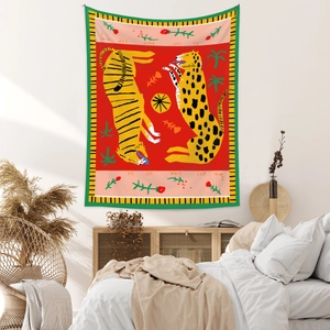 Detailed view of Big Cats Don't Cry tapestry hanging above a bedroom bed for home decor