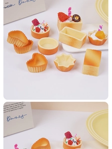 Detailed close-up of mini DIY simulation dessert models including toast and tart shells