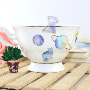 Starry cat theme DIY crystal epoxy stickers with gold glitter on white ceramic cup