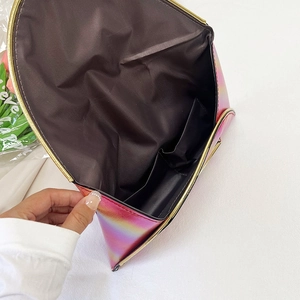 Rainbow gradient envelope clutch bag with gold trim and spacious interior lining