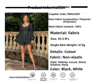 Detail view of black hollow-out mini dress with bubble sleeves and fabric specifications