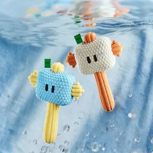 Washable plush hammer dog toy with textured corn velvet fabric in clear water