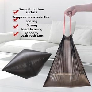 Detail view of thickened drawstring garbage bags with round bottom and red ties
