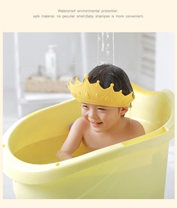 Waterproof yellow crown baby shower cap for ear protection during bathing time