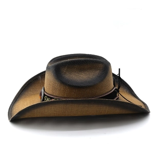 Detail of western straw cowboy hat with gradient finish and ethnic beaded leather band