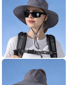 Détail d'un chapeau de soleil gris avec broderie Sport, large bord et jugulaire