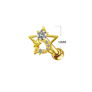 Detail showing gold moon and star cartilage stud with 10mm needle length and clear gems