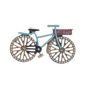Vintage light blue bicycle brooch with sparkling rhinestones and retro metal frame