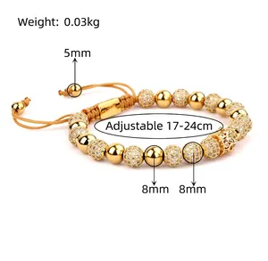 Detail view of gold crown beaded bracelet with adjustable cord and size specifications