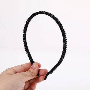 Fashionable double-row black faceted beaded headband with shimmering crystal details