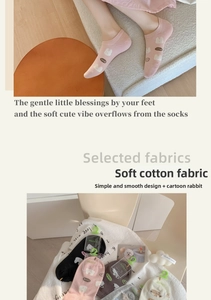 Close-up of soft cotton socks featuring cute cartoon rabbit embroidery and LOVE letters
