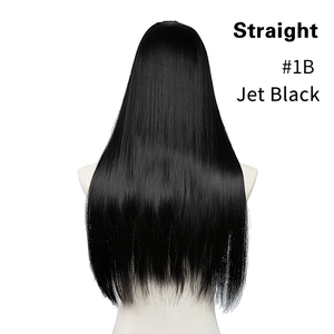 Detail view of smooth long jet black straight hair extension in shade 1B from behind