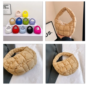 Macro view of beige quilted cloud bag showing puff padding and stitch details