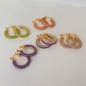 Five pairs of colorful zircon-set geometric stainless steel hoop earrings on white background