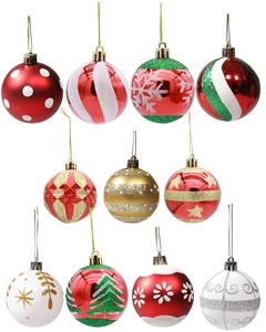 Detail of 11-piece hand-painted Christmas balls with red, green, and white snowflake patterns
