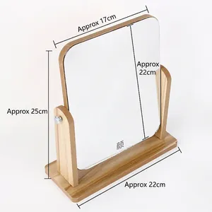 Detail view of rotating desktop wooden makeup mirror showing dimensions 25cm by 22cm